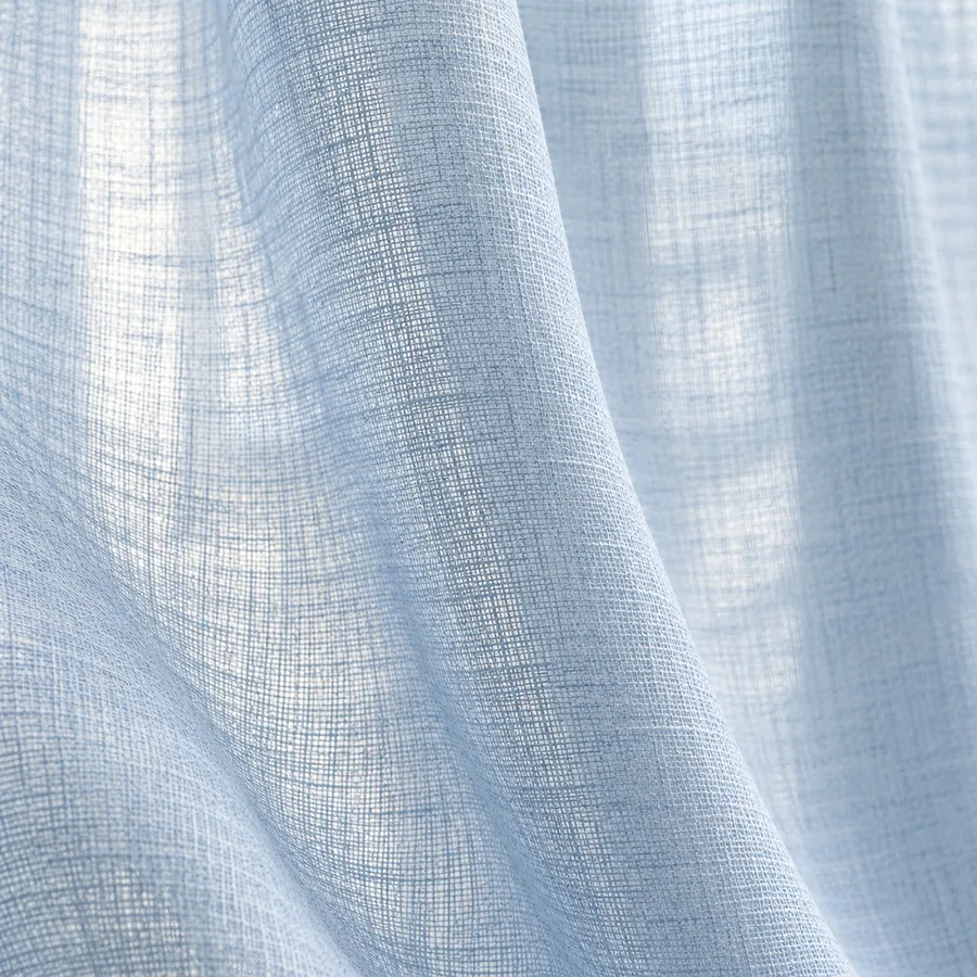 Soft blue light and airy linen-look sheer texture