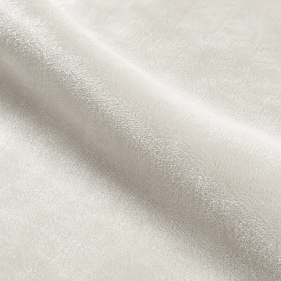 Close-up of chalk white plain velvet pile