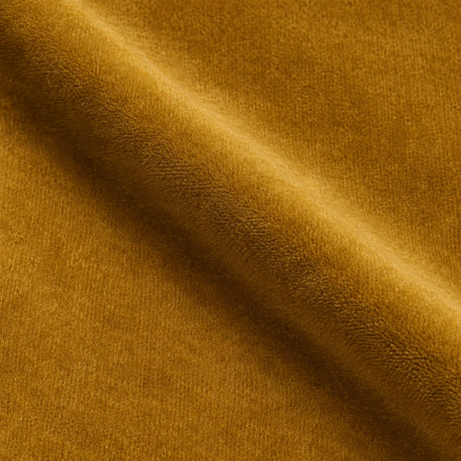 Close-up of ochre gold plain velvet pile