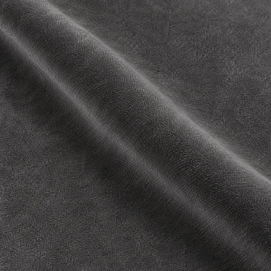 Close-up of soft charcoal plain velvet pile